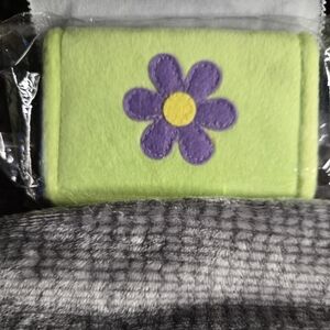 Colorful Flower Wallet 10 1/4" × 4 1/4" wide color: Green, purple, yellow.